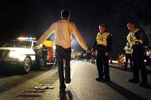 a person walking a line to check for sobreity