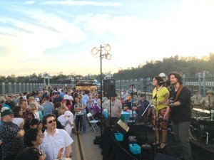 People listening to musicians on stage
