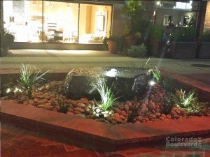 a fountain in the middle of a courtyard
