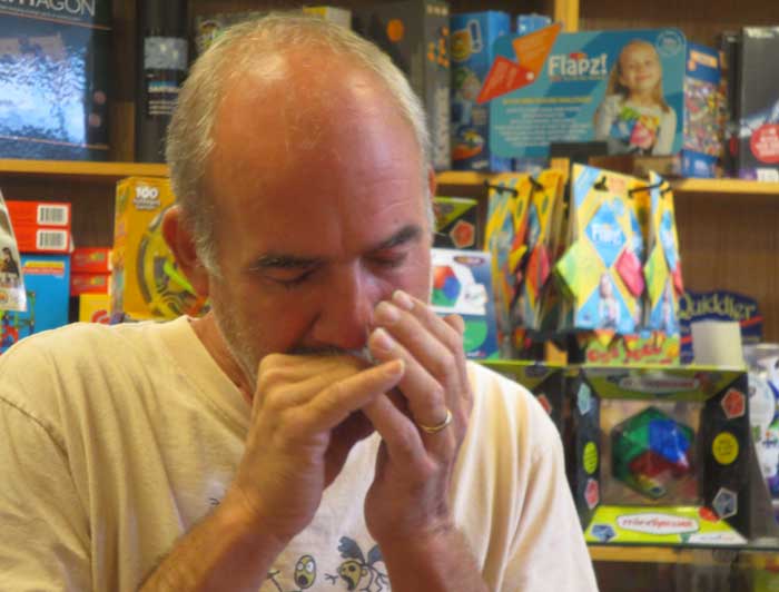 Dalton Perry playing harmonica at Moonday, Flintridge Bookstore.