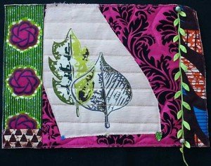 a colorful stitched quilt