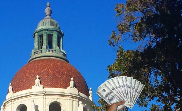 a hand holding money