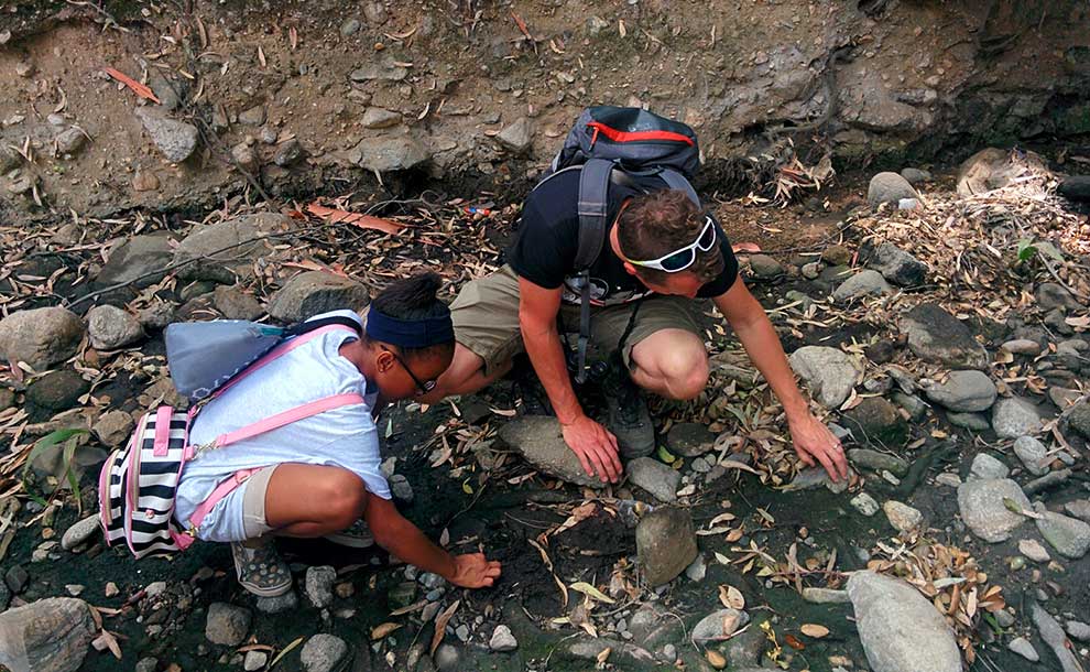 Bas Van Schooten, PAS member, sharing a nature lesson with a YWCA Girls Empowerment participant (Photo - Kym Buzdygon).