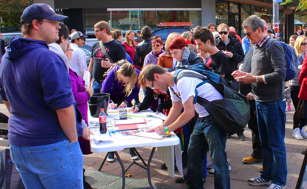 Gathering signatures (Photo - Andrew Gould).