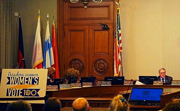 A man sitting on a dais