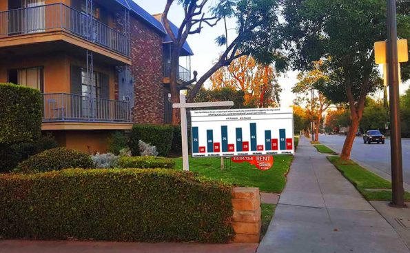 a sign on a rental building