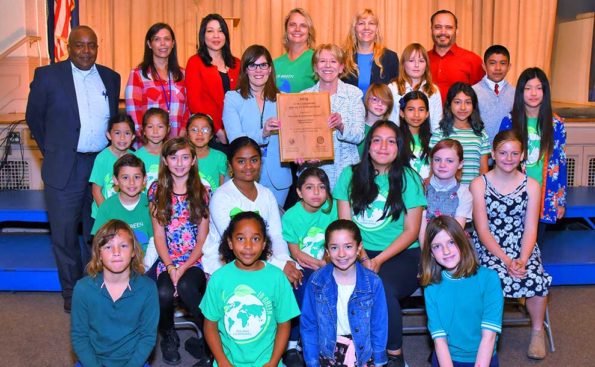 Lee Smalley Edmon is surrounded by Willard Elementary students, teachers, principle and PUSD Superintendent