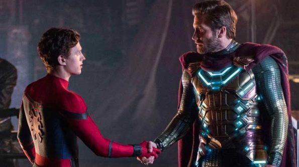 A kid in a spider suit shakes hands with a man in a sure hero outfit