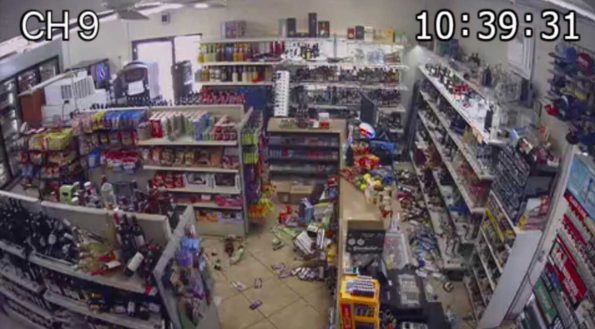 liquor store damaged with items on the floor