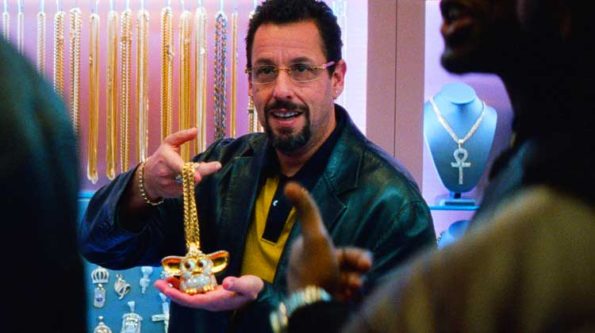 A man holding a cheap item for sale