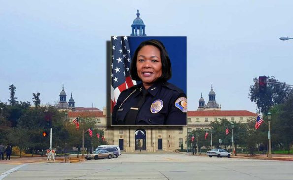 An African American woman in a police uniform