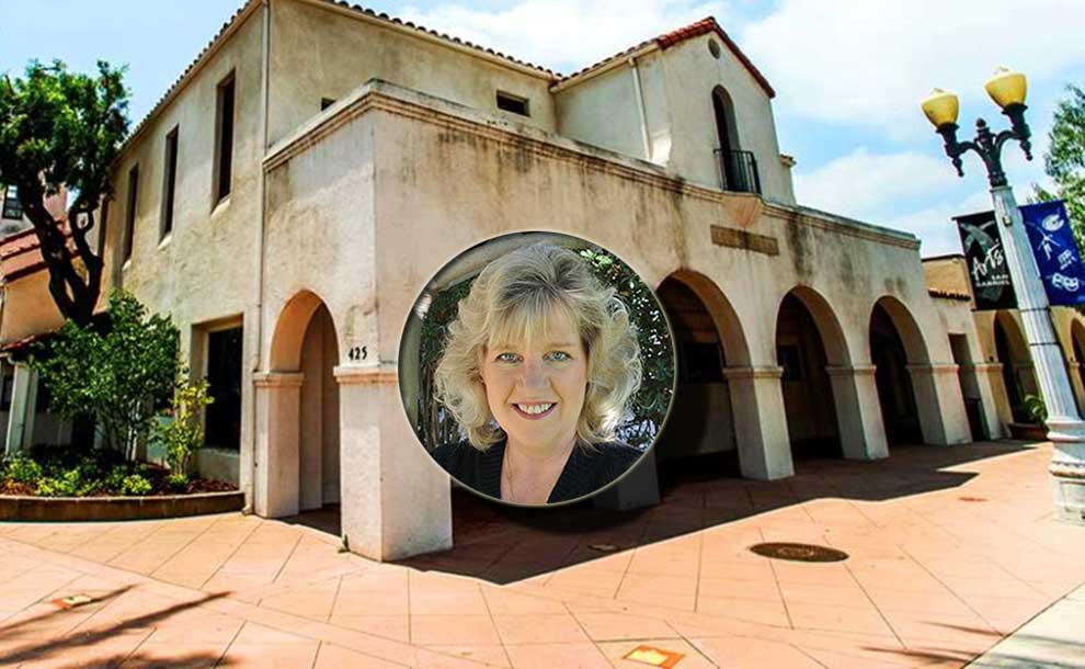 City hall with a photo of a blond woman inserted in the middle