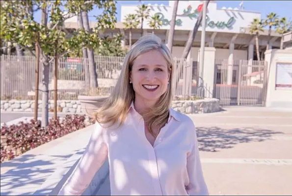 A white woman in white dress