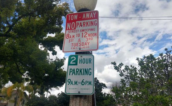 two signs on a column