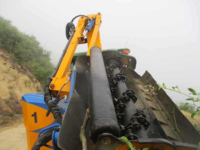 A machine in the forest to cut branches and large vegetation