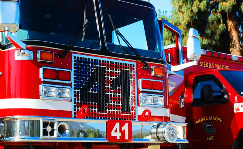 two red fire engines with Sierra Madre emblem