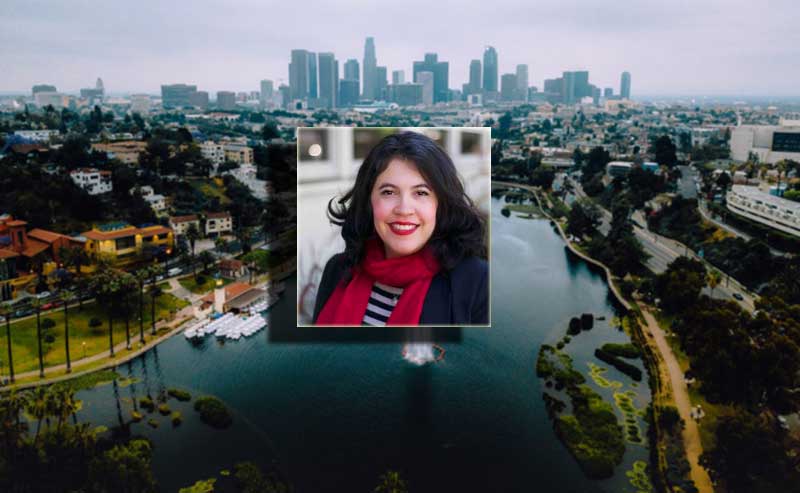 A woman in a red scraf and striped shirt over a scene from a water lake and skylines