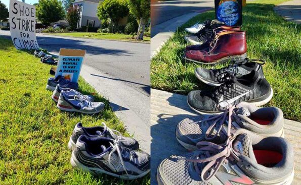 shoes of different sizes and colors line up on a sidewalk