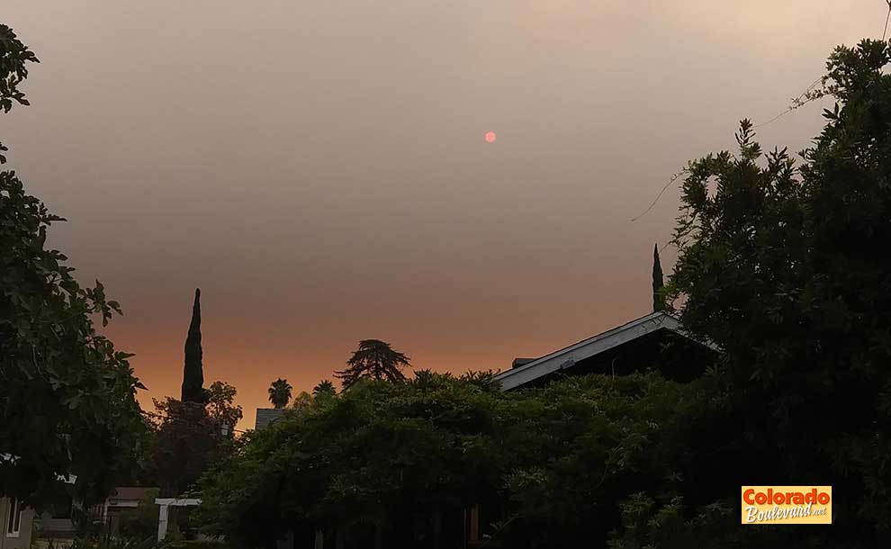 moon-shaped sun by smoke