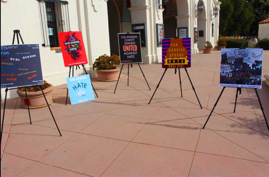 five colorful canvases on easles