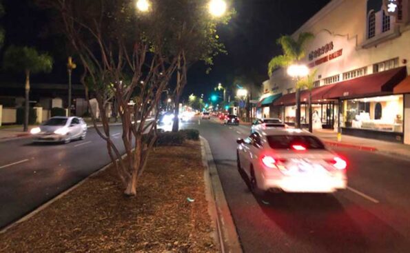 A cross stree with cars