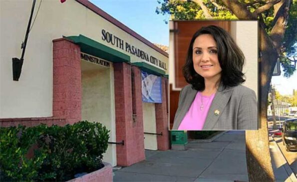 A lady wearing a blazer and smiling