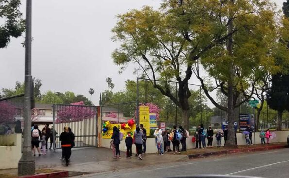 students lining up at the gate