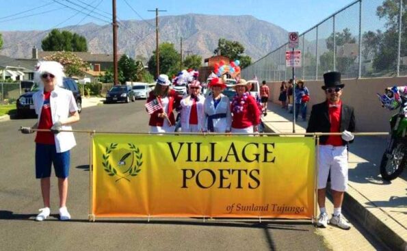 marching holding a banner