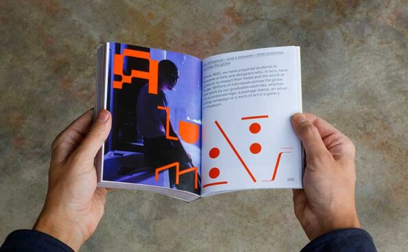 hands holding an open book