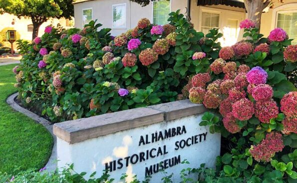 a concrete sign of Alhambra Historica Society sign