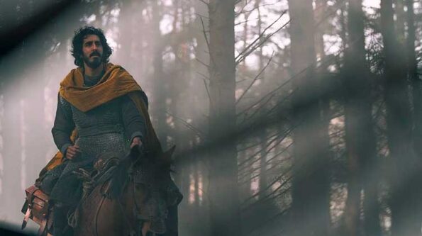 a knight on his horse in a forest