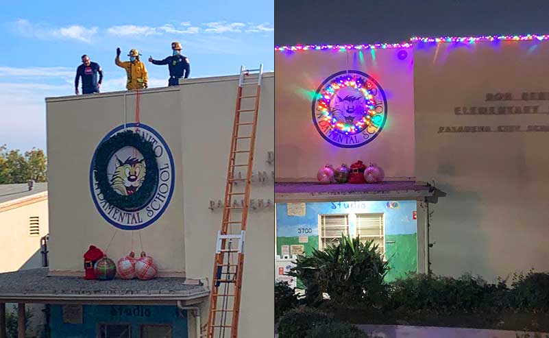 Firefighters on roof installing lights and lights at night