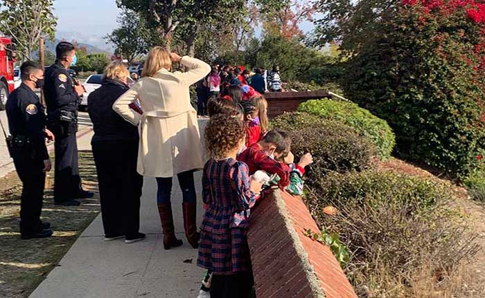 spectators watching lights installation