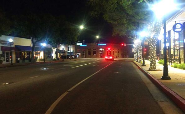 a car on a street at night