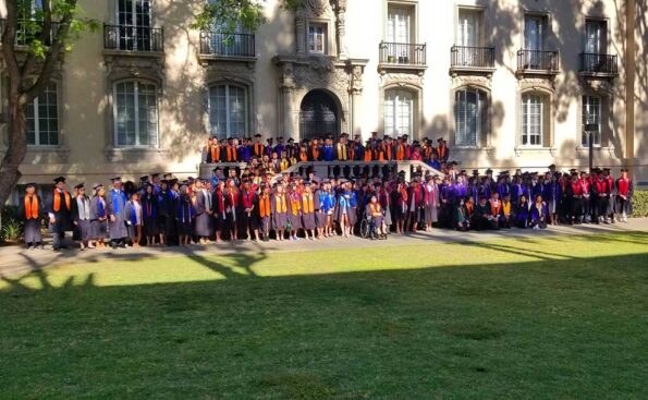 A group of students fill stairs