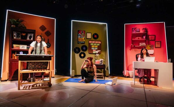 three women on stage