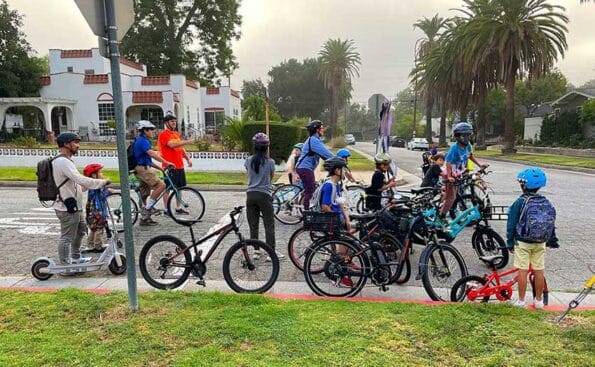 Bicyclists waiting at a park