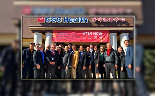 Group of people gather outside