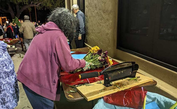 A woman with a flower cutter