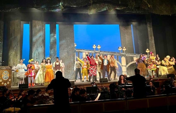 Student performers on stage