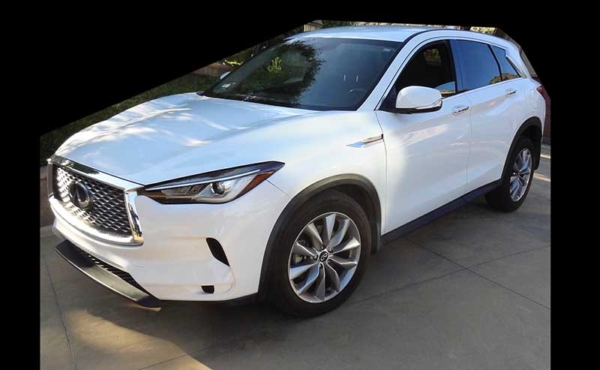 a white car parked on street