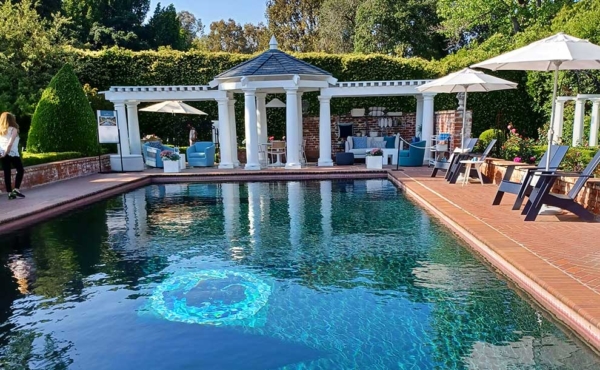 A fancy pool with deep blue clear water