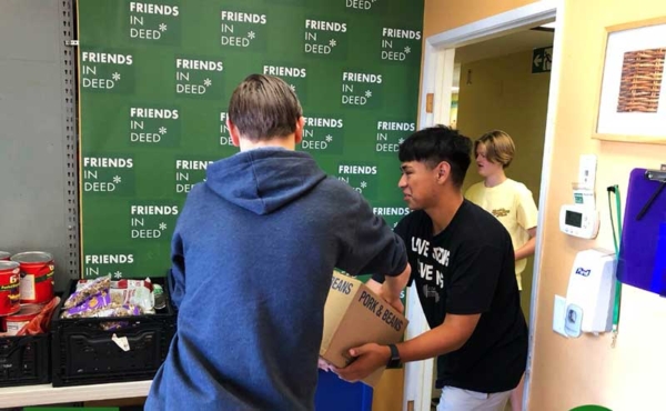 people helping with donations