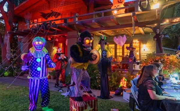 halloween decorations with people sitting and eating