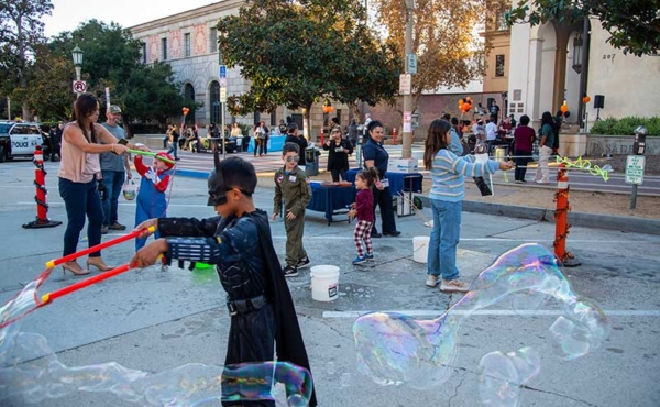 kids dressed up in Halloween costumes