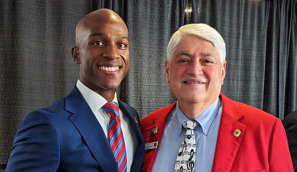 two people smiling at camera