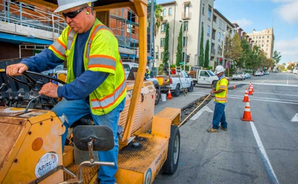 workers on a street working