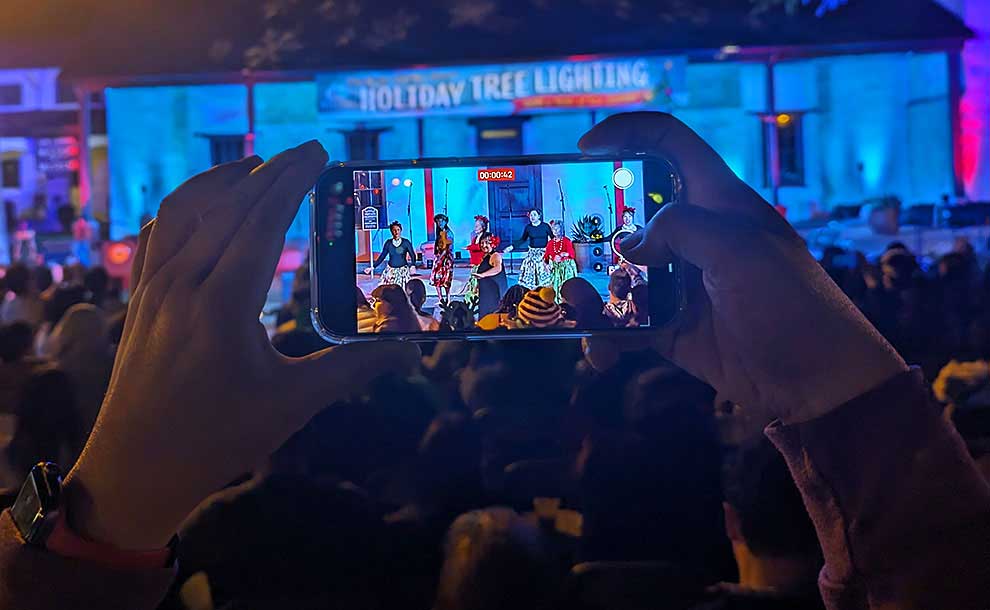 someone taking a video of a dance