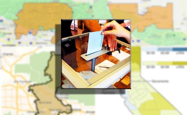 A woman casting a vote in a ballot with district maps in the background