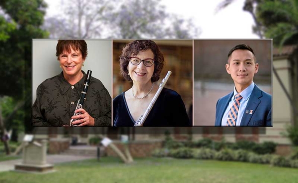Three people smiling and holding instruments